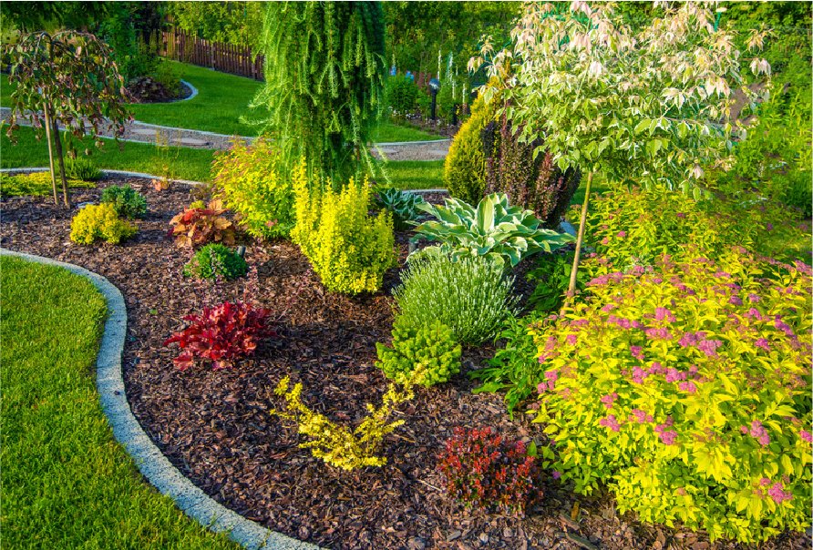 Colorful planting beds with fresh mulch