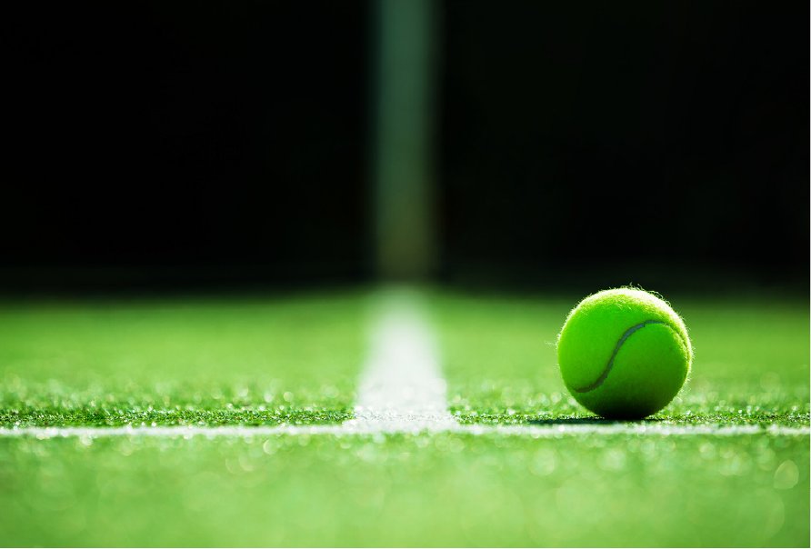 Tennis ball on a synthetic court