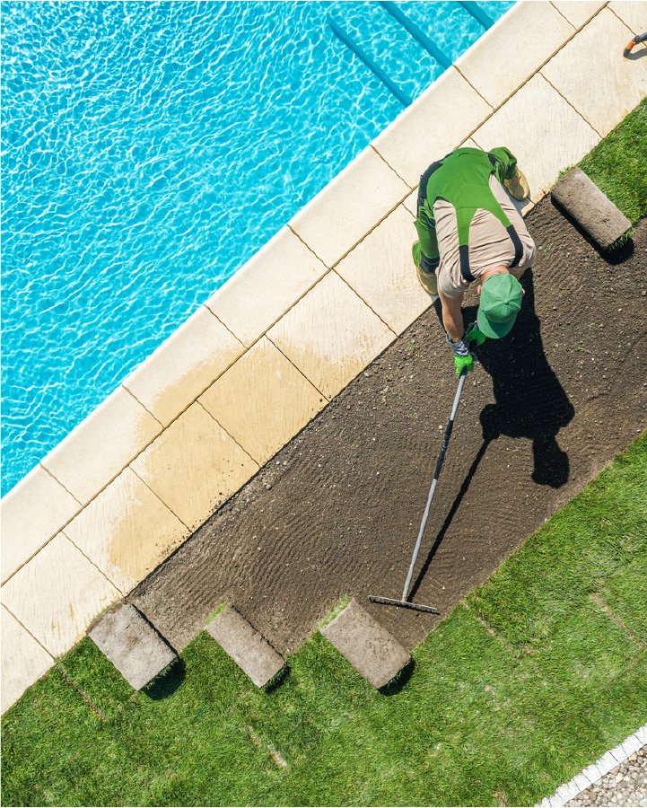 Laying sod beside a pool